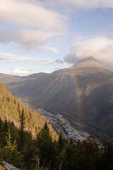 View cloud over tall and rainbow mountain is impressive, Gaustatoppen and town Rjukan, City in the valley Norway, Summer landscape