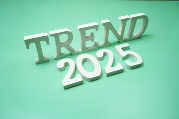 Trend 2025 alphabet letter on green background