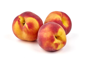 Fresh peaches, isolated on white background.