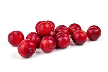 Sweet red plums, isolated on white background.