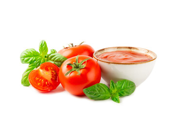 Tomato paste, sauce, ketchup in a bowl and cherry tomatoes with fresh basil leaves isolated on a white background. Vitamins and detox diet. Vegetable and vegetarian food.