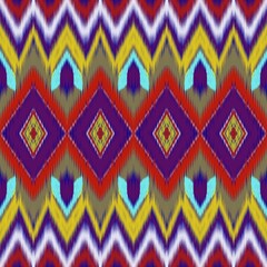 Colorful ikat pattern in vintage style. Elegant ethnic background. Hand drawn oriental art. Seamless geometric vintage texture