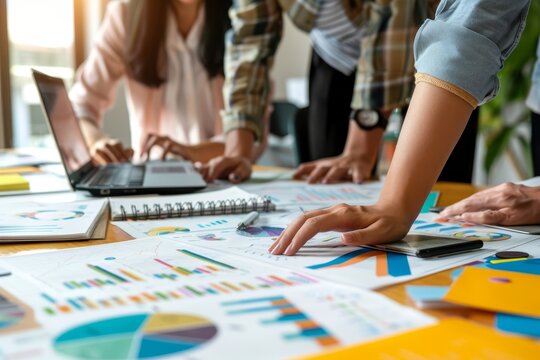 Web designer, planning and team in office with laptop, market research or problem solving in development of project. Website, design and people with technology for online marketing, Generative AI