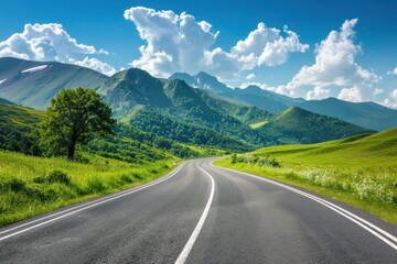 Naklejka premium Rural highway with scenic mountains landscape