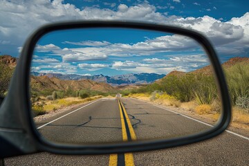 Scenery behind through Arizona rearview mirror