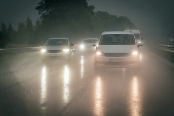 Rain while driving on the motorway in the evening.