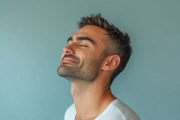 Fototapeta premium A close up of a man's face with his eyes closed