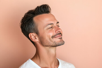 Obraz premium A close up of a man's face with his eyes closed
