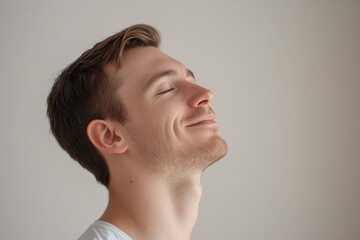 Obraz premium A close up of a man's face with his eyes closed