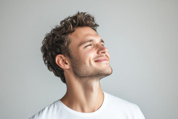 Fototapeta premium A close up of a man's face with his eyes closed