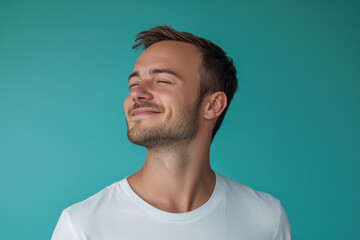 Obraz premium A close up of a man's face with his eyes closed
