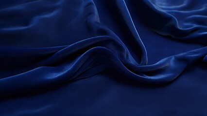 Obraz premium Dark blue silky fabric with a smooth texture, neatly folded and draped. Perfect for backgrounds, fashion design, or luxury concepts. 