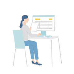 会計ソフトに入力するビジネスパーソン