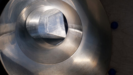 Abstract empty round spiral circular metal tunnel with copy space
