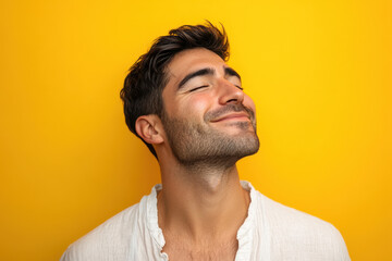 Obraz premium A close up of a man's face with his eyes closed