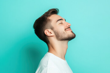 Fototapeta premium A close up of a man's face with his eyes closed