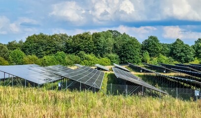 Generating clean energy with solar modules in a big park in northern Europe