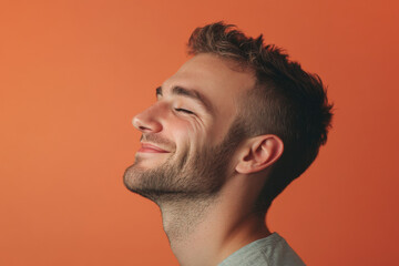 Obraz premium A close up of a man's face with his eyes closed