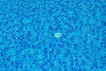 blue water in swimming pool background