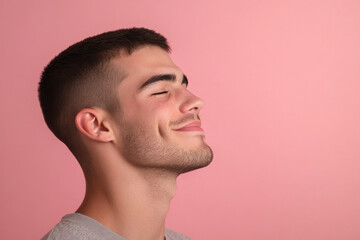 Obraz premium A close up of a man's face with his eyes closed