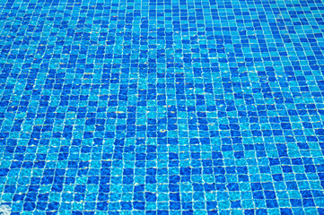 Blue ripped water in swimming pool