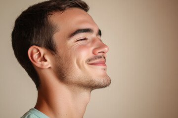 Obraz premium A close up of a man's face with his eyes closed