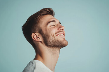Fototapeta premium A close up of a man's face with his eyes closed