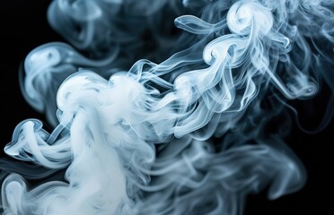 Fototapeta premium Swirling smoke fills the air against a black backdrop.