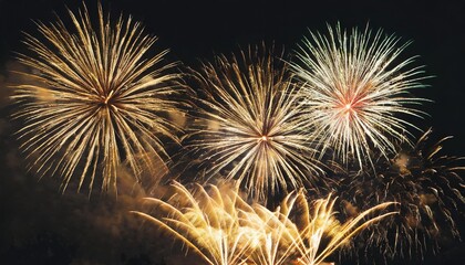 Fireworks exploding in a night sky for wallpaper, design, graphic, print or banner with copy space