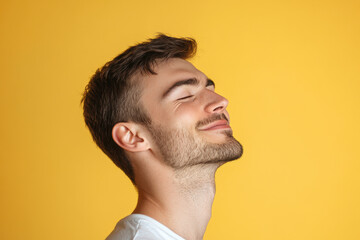 Fototapeta premium A close up of a man's face with his eyes closed