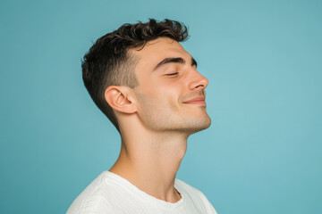 Obraz premium A close up of a man's face with his eyes closed