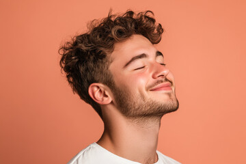 Fototapeta premium A close up of a man's face with his eyes closed