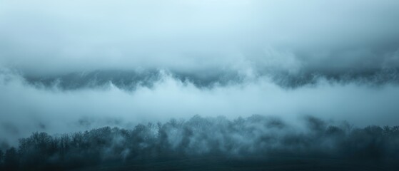 Obraz premium Enshrouded in Mystery: Eerie Landscape with Dense Fog and Ominous Clouds - Perfect for Horror and Suspense Themes