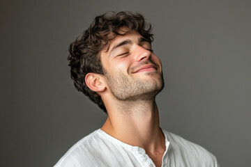 Fototapeta premium A close up of a man's face with his eyes closed