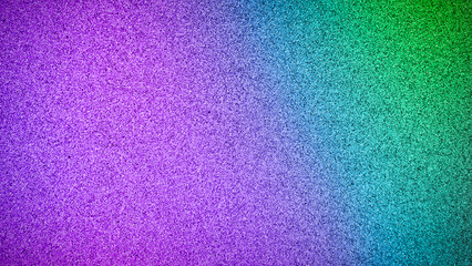 Vibrant multicolored grainy texture background in 4K resolution, featuring a gradient of purple, blue, and green tones. Ideal for digital designs, banners, and wallpapers