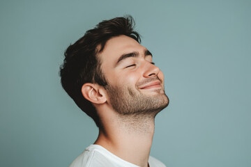 Fototapeta premium A close up of a man's face with his eyes closed