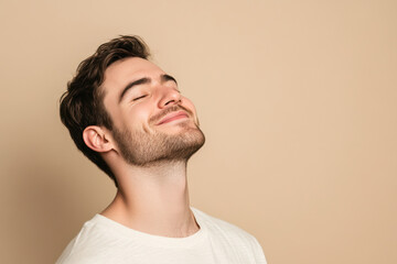 Fototapeta premium A close up of a man's face with his eyes closed