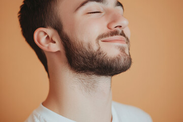 Fototapeta premium A close up of a man's face with his eyes closed