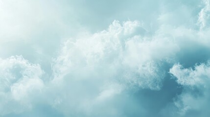 A serene sky filled with soft, fluffy clouds in a light blue atmosphere.