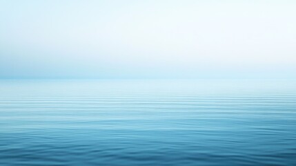 Obraz premium A calming blue background with soft gradient effects, evoking a sense of tranquility and peace.