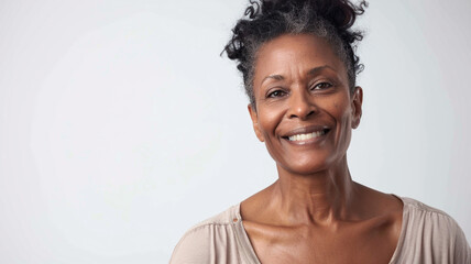 portrait of happy middle aged black woman isolated on white background