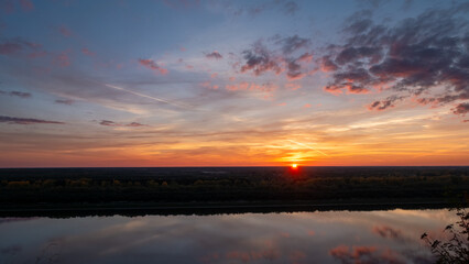 Tranquil Sunset Reflections over Calm River