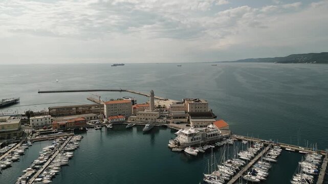 Ex Lighthouse La Lanterna In Trieste Harbour At Adriatic Sea In Molo Fratelli Bandiera, Trieste, Italy. Aerial Shot