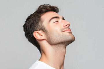 Obraz premium A close up of a man's face with his eyes closed