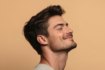 Obraz premium A close up of a man's face with his eyes closed