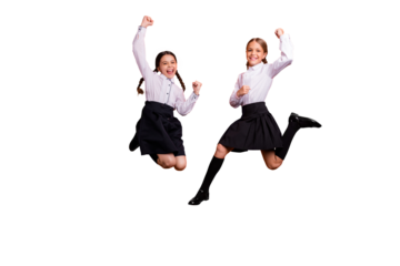 Full length body size view of two person nice attractive lovely charming cute ecstatic overjoyed cheerful cheery pre-teen girls having fun rejoice isolated on bright vivid shine orange background
