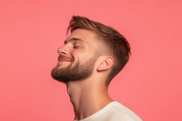Fototapeta premium A close up of a man's face with his eyes closed