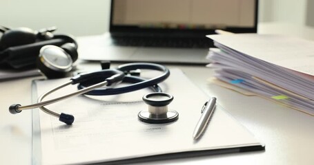Stethoscope and medical documents on the table