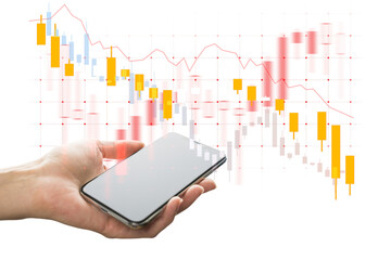 Hand holding smartphone with blank screen, overlaid with stock market candlestick chart, on white background. Concept of financial data and trading
