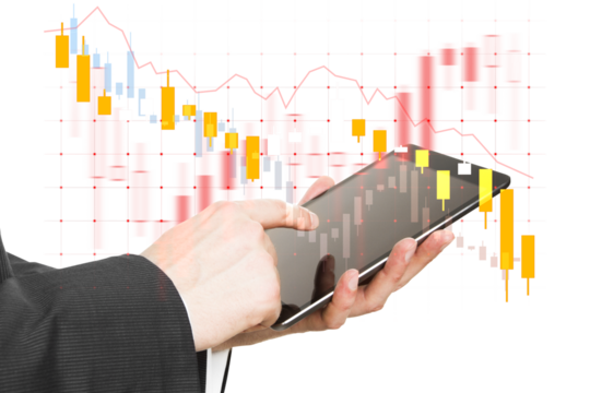 Businessperson using a tablet to analyze stock market data, with a digital candlestick chart in the background. Financial technology concept